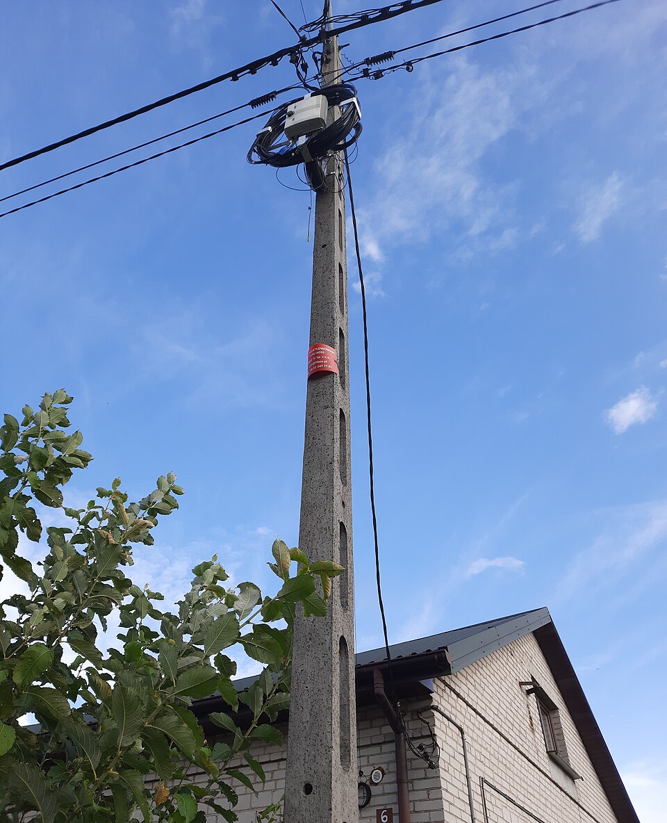 Aerial ADSS optical fiber cable run on a utility pole