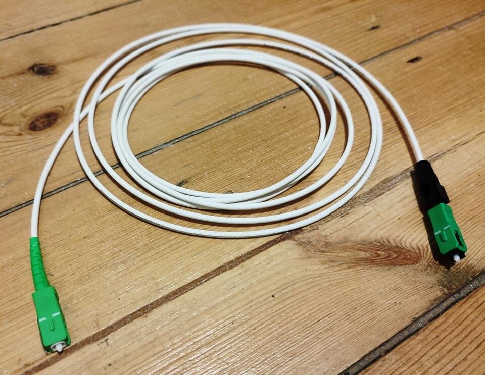 Physical green SC/APC optical fiber connector and patch lead