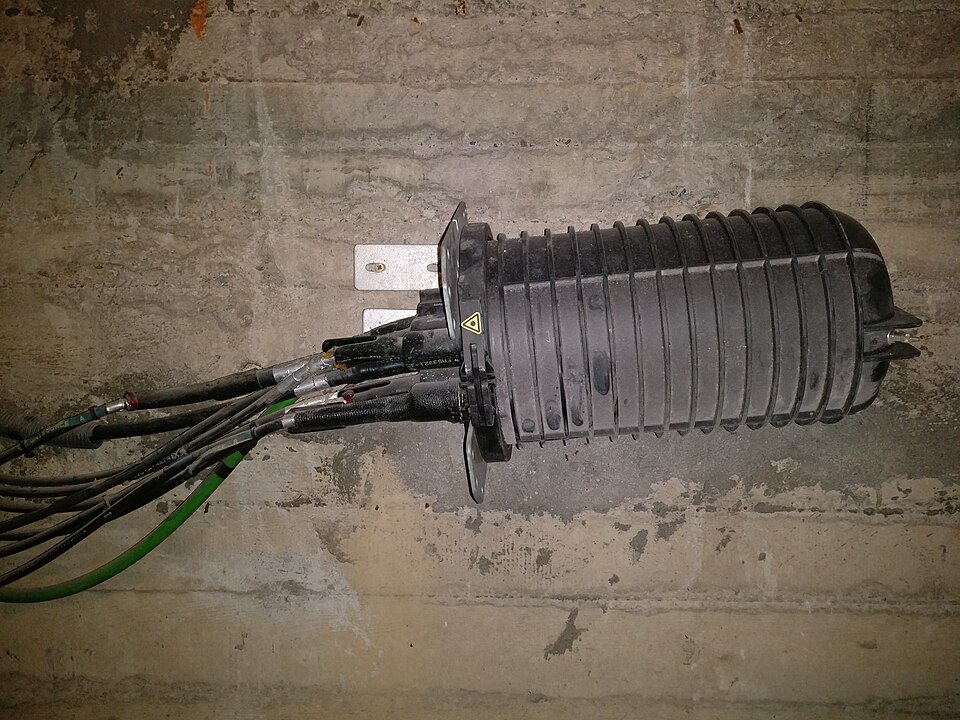 Real installed optical fiber splice closure for protective outdoor splicing